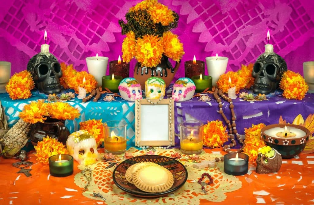 Dia de Los Muertos ofrenda with traditional foods
