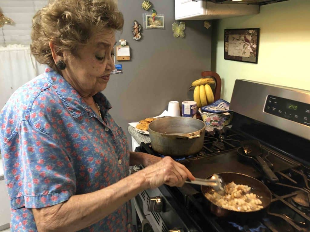 Doña Felipa makes Puerto Rican arroz con gandules for the holidays.