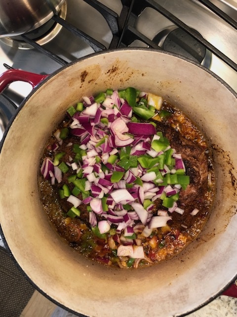 I've been hankering for a street taco and have been played around with different barbacoa beef taco recipes. Barbacoa has the distinct flavor of cumin, but because it is slow cooked, the beef gets a deep smoky, almost coffee like, flavor. The best cut of beef to use for barbacoa is brisket. 