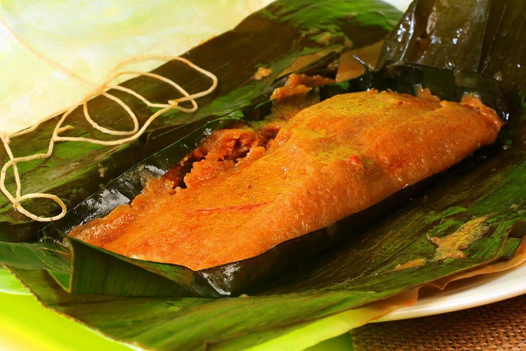 Banana Leaf-Wrapped Lamb Shank Tamales with Morita Chile Salsa