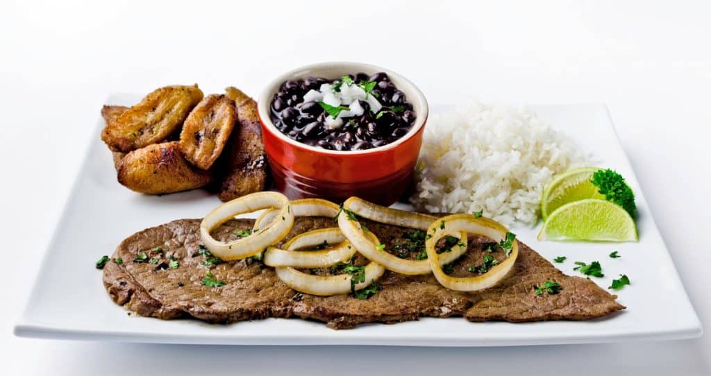 Cuban steak bistec and rice and onions