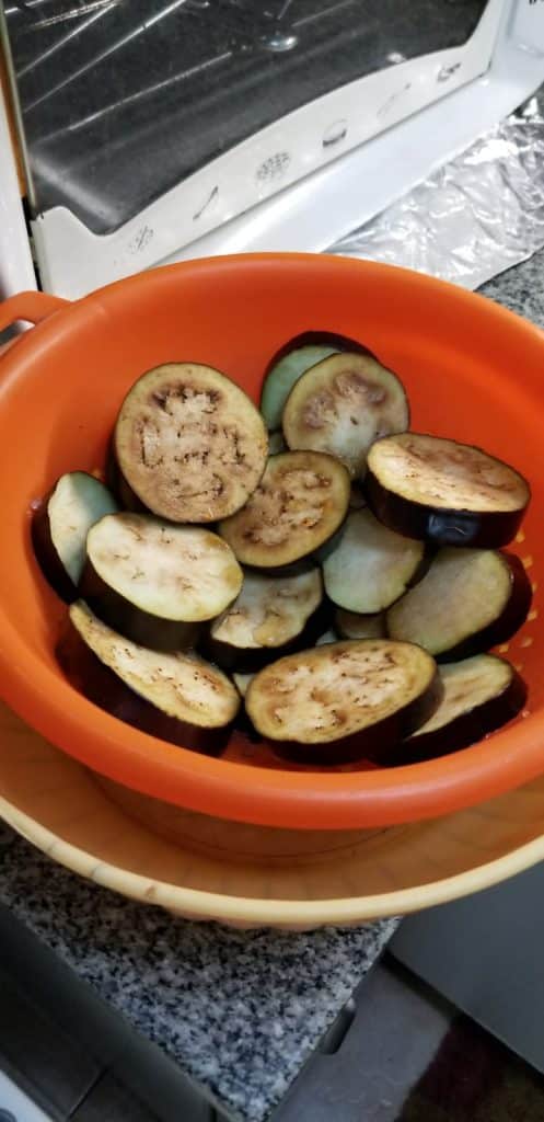 Sweating the eggplants to release the bitter juices.