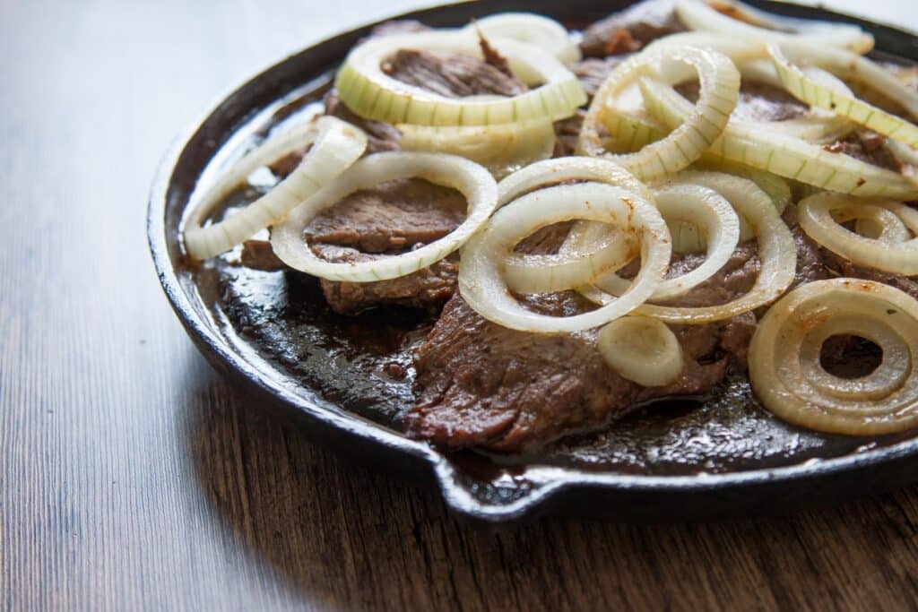 bistec encebollado or breaded Cuban steak and onions
