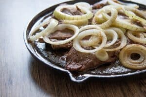 bistec encebollado or breaded Cuban steak and onions